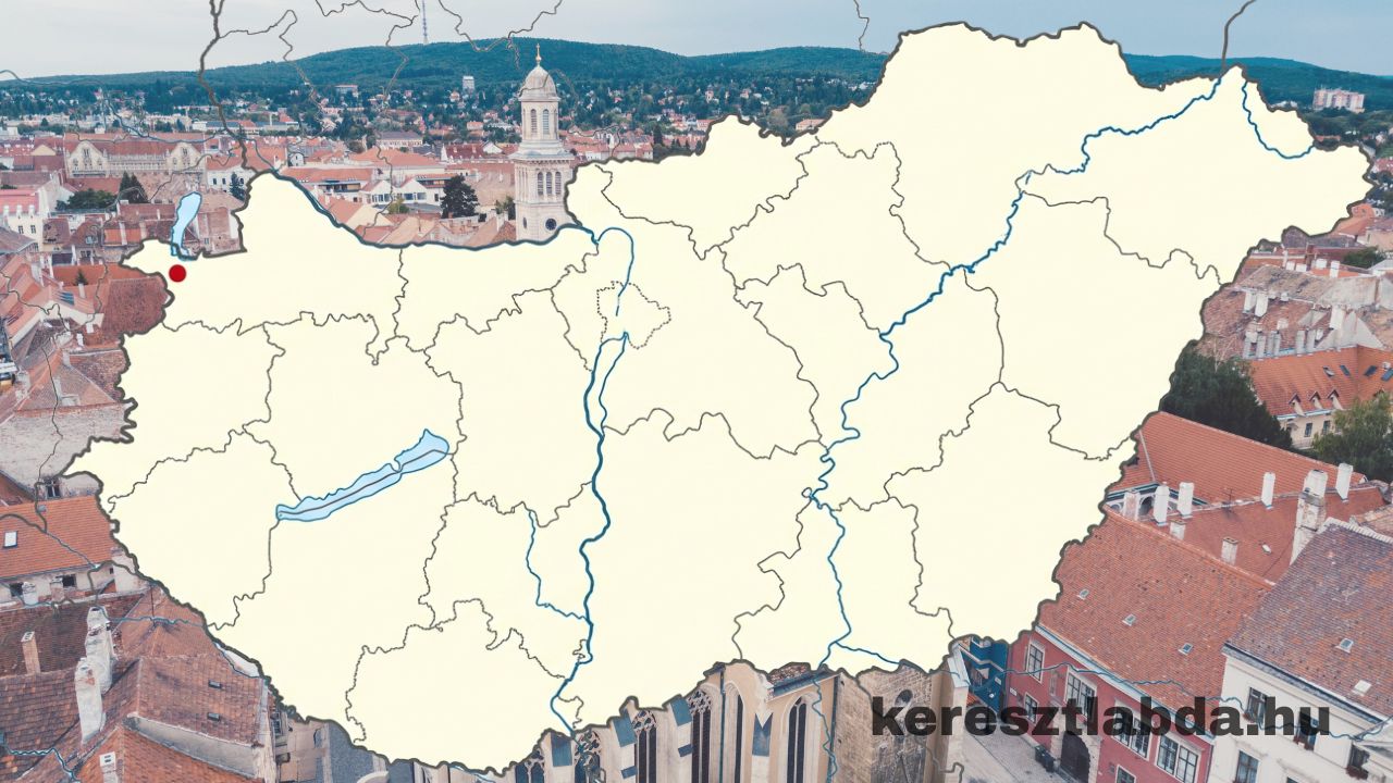 Magyarország megyehatáros térképe a nyugati határnál egy piros ponttal, a háttérben egy templomtornyos történelmi belváros földrajz feladat